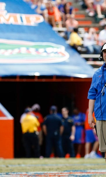 Gators coach Will Muschamp makes special delivery to Gainesville couple